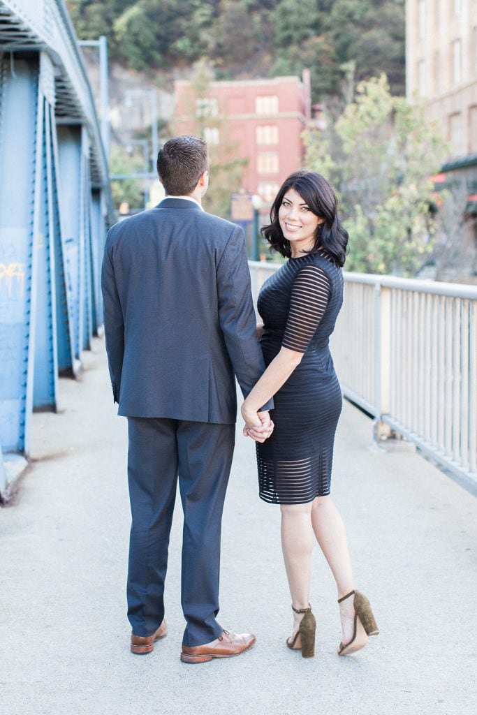 Mount Washington and South Side Engagement Bride and groom on Smithfield Street Bridge in Pittsburgh