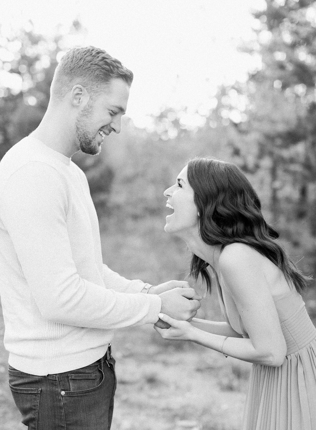 Destination Engagement Session - Lauren Renee Photography Black and white photo of couple laughing