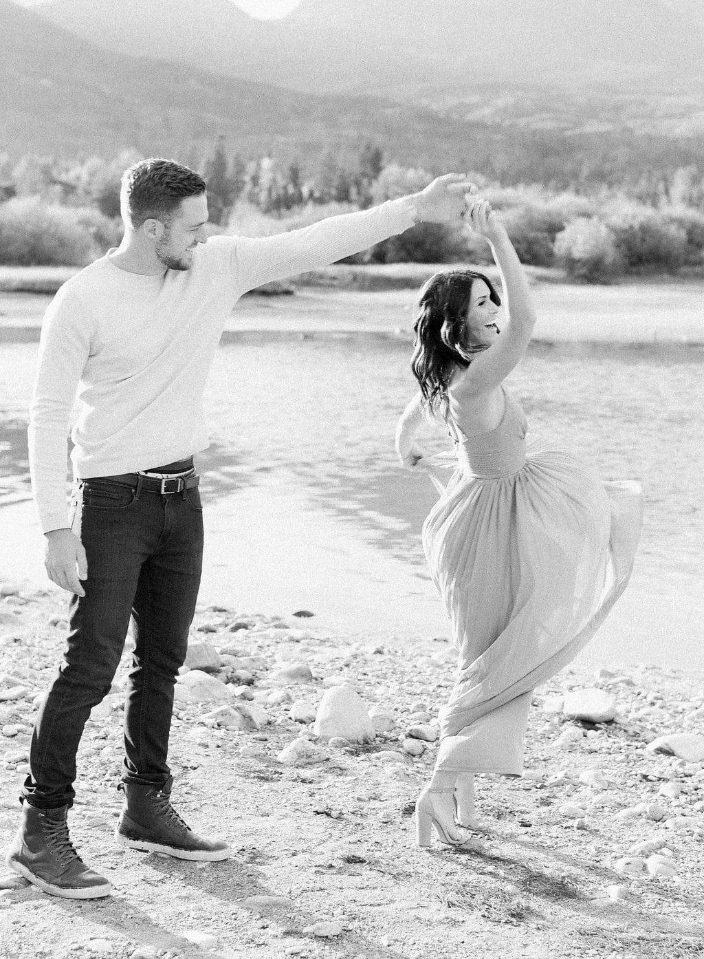 Destination Engagement Session - Lauren Renee Photography Groom dancing with his bride and spinning her