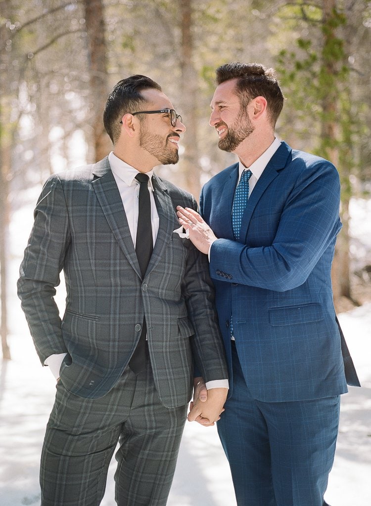 Sam-Sex Engagement Session - Lauren Renee Photography two men in suits holding hands during photo session