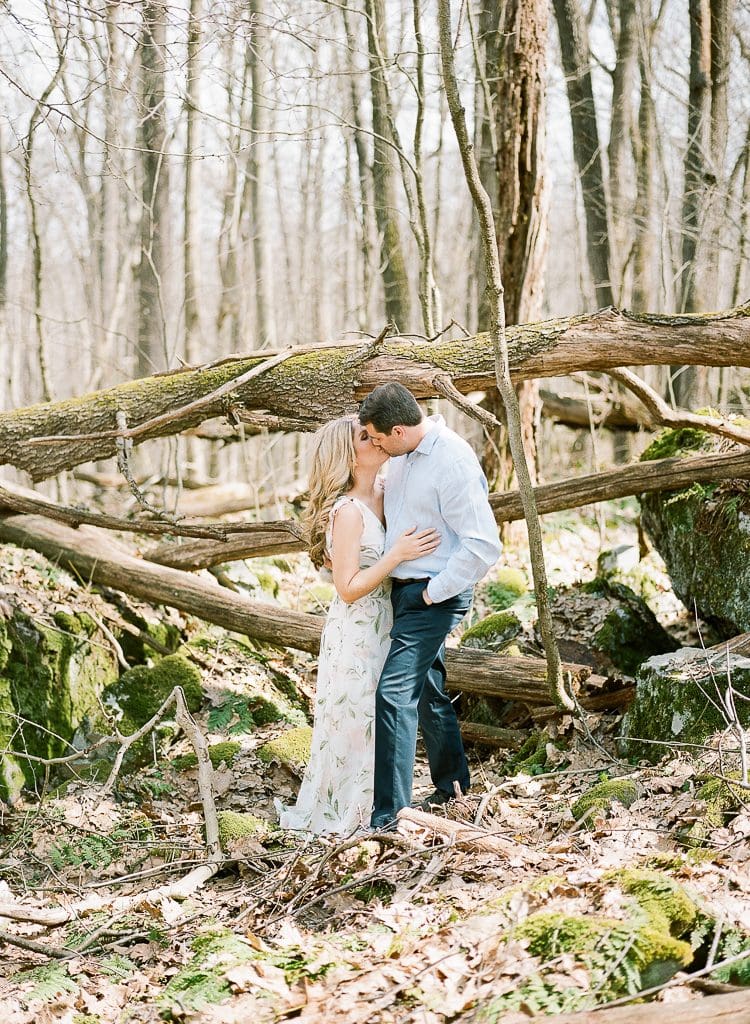 Seven Springs Engagement Photography - bride and groom kissing in the woods