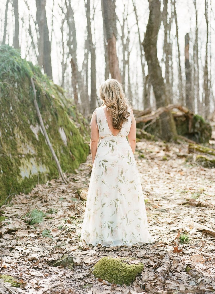 Engagement Session - Lauren Renee Photography bride standing in the woods near moss covered rocks
