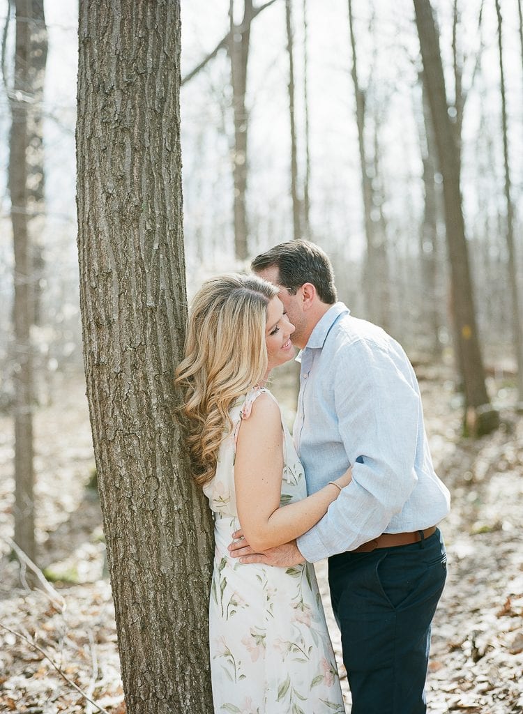 Seven Springs Engagement Photography - bride and groom laughing near a tree