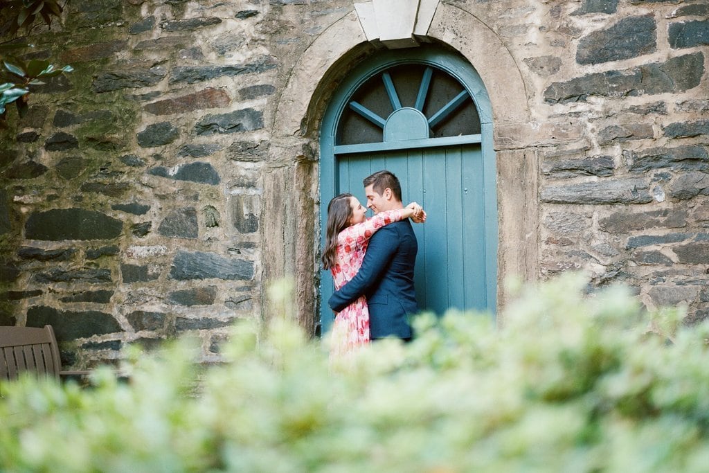 Engagement Session - Lauren Renee Photography Engagement photos at the Carlyle House in Alexandria Virginia couple standing by the blue door