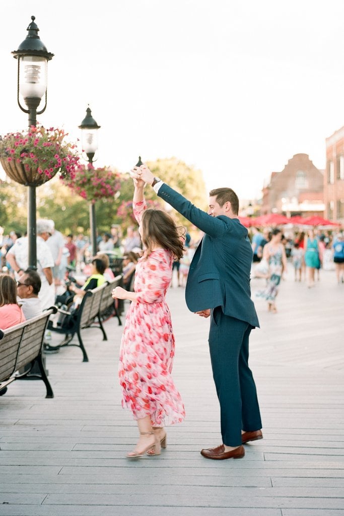 Engagement Session - Lauren Renee Photography Couple walking and dancing and holding hands on the dock