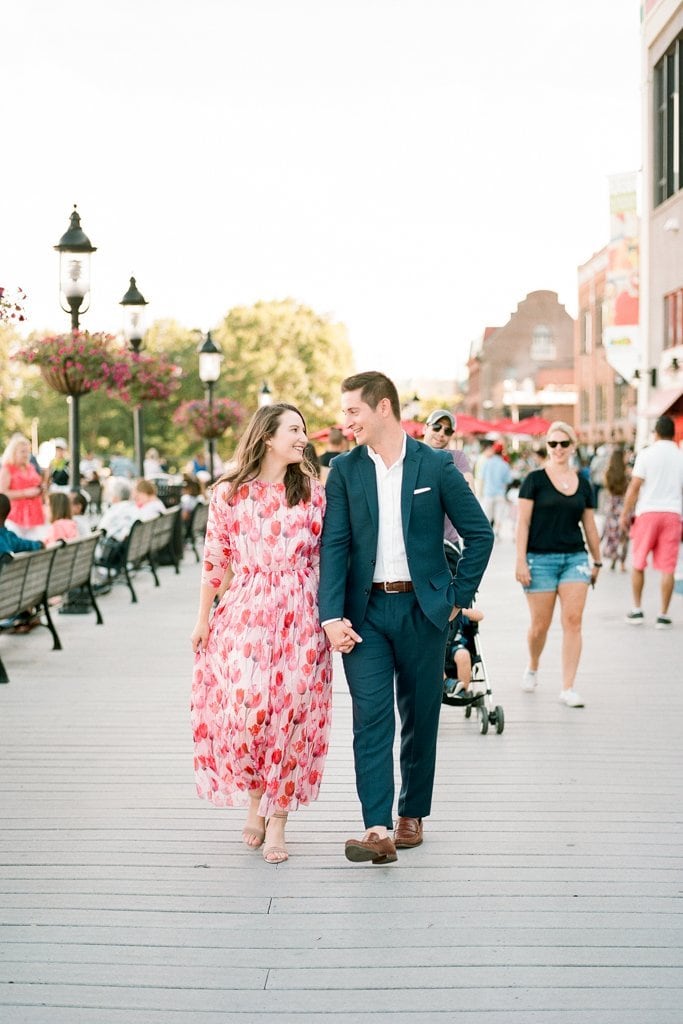 Engagement Session - Lauren Renee Photography Couple walking and holding hands on the dock in Old Town Alexandria