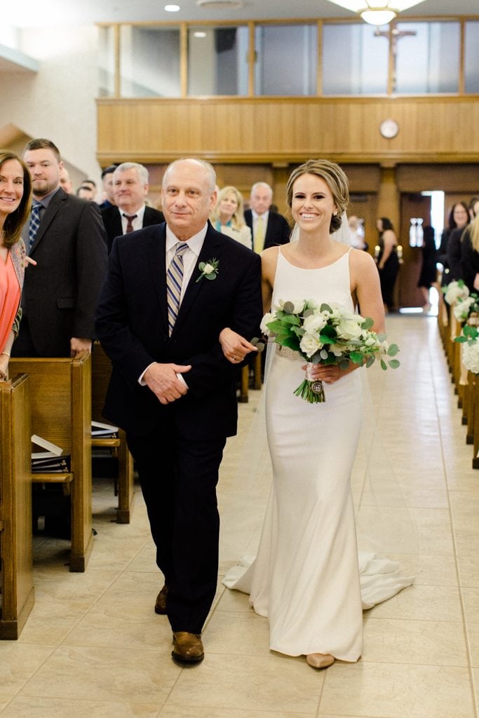 The Pennsylvanian Wedding bride walking down the aisle at St. Bede's Church