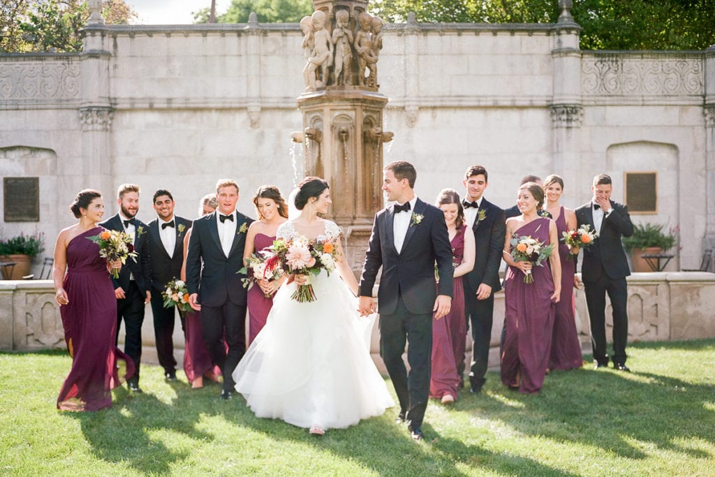 Bridal party photos in front of the fountain at the walled garden