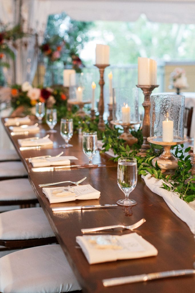 Long head table with brown chiavari chairs