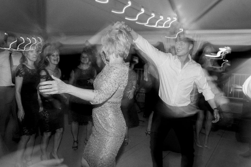 Mother of the bride dancing at wedding reception