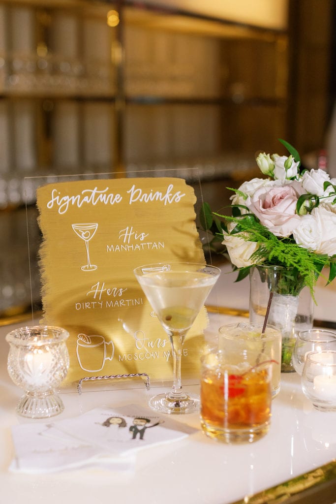 Signature cocktails with oh joyful day signage