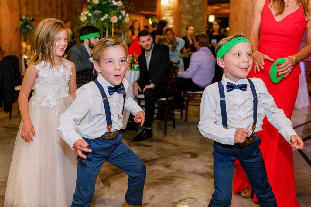 Children and guests dancing at wedding reception