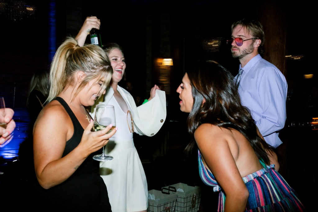 Guests and family dancing at wedding reception