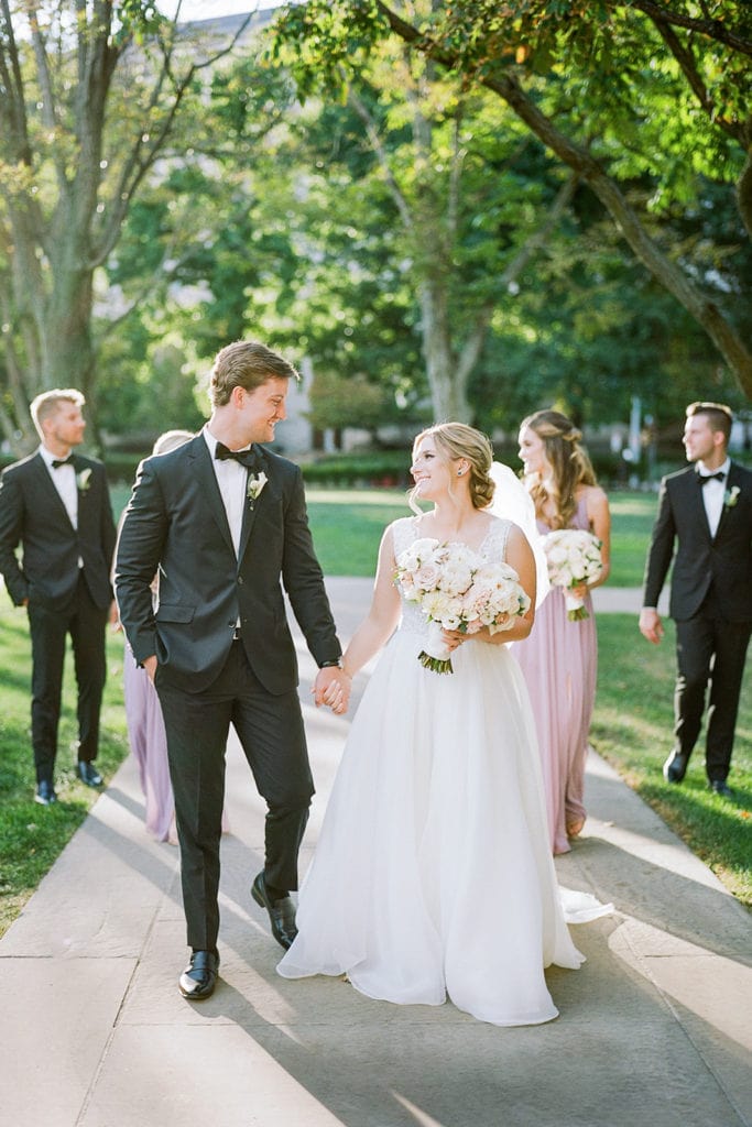 Bridal party walking together on University of Pittsburgh's campus