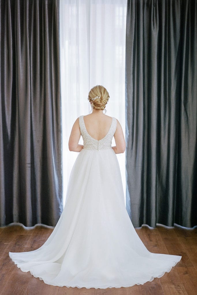 The back of a daalarna couture wedding dress on a bride