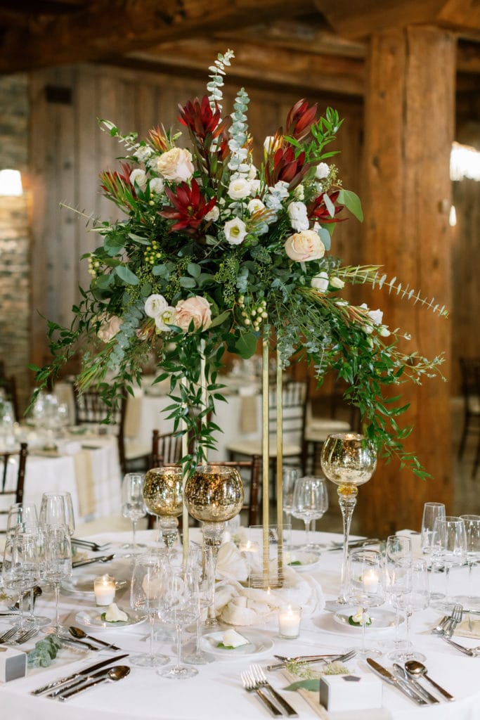 Tall red and white wedding centerpieces: Outdoor Fall Seven Springs Wedding captured by Pittsburgh Wedding Photographer Lauren Renee