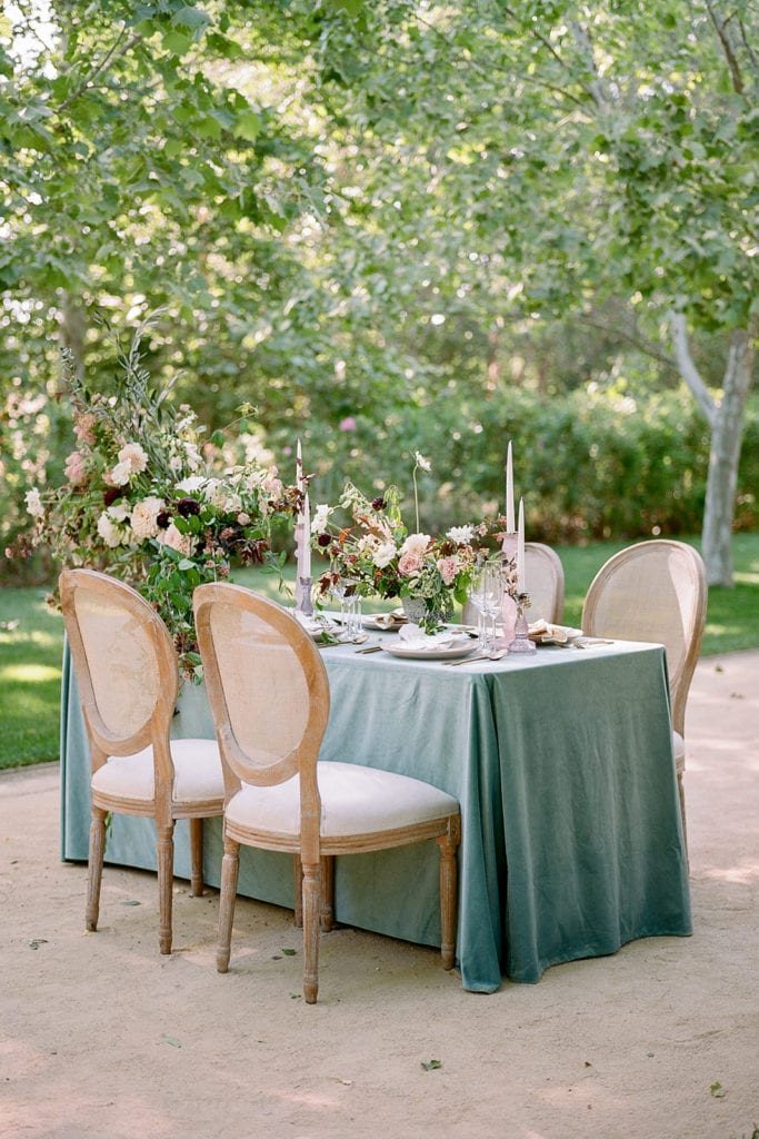 Intimate table setup for two beneath the trees at Kestrel Park