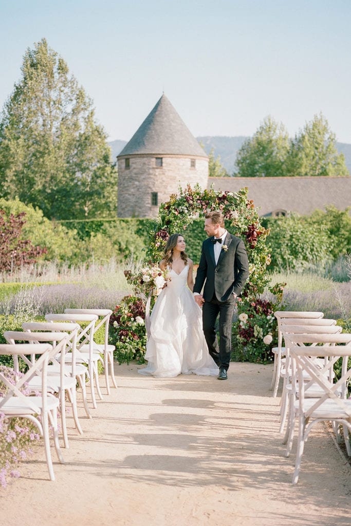 Ceremony Arch with flowers by Emily Reynold Design: Kestrel Park California Wedding Inspiration Styled Shoot captured by Pittsburgh Wedding Photographer Lauren Renee