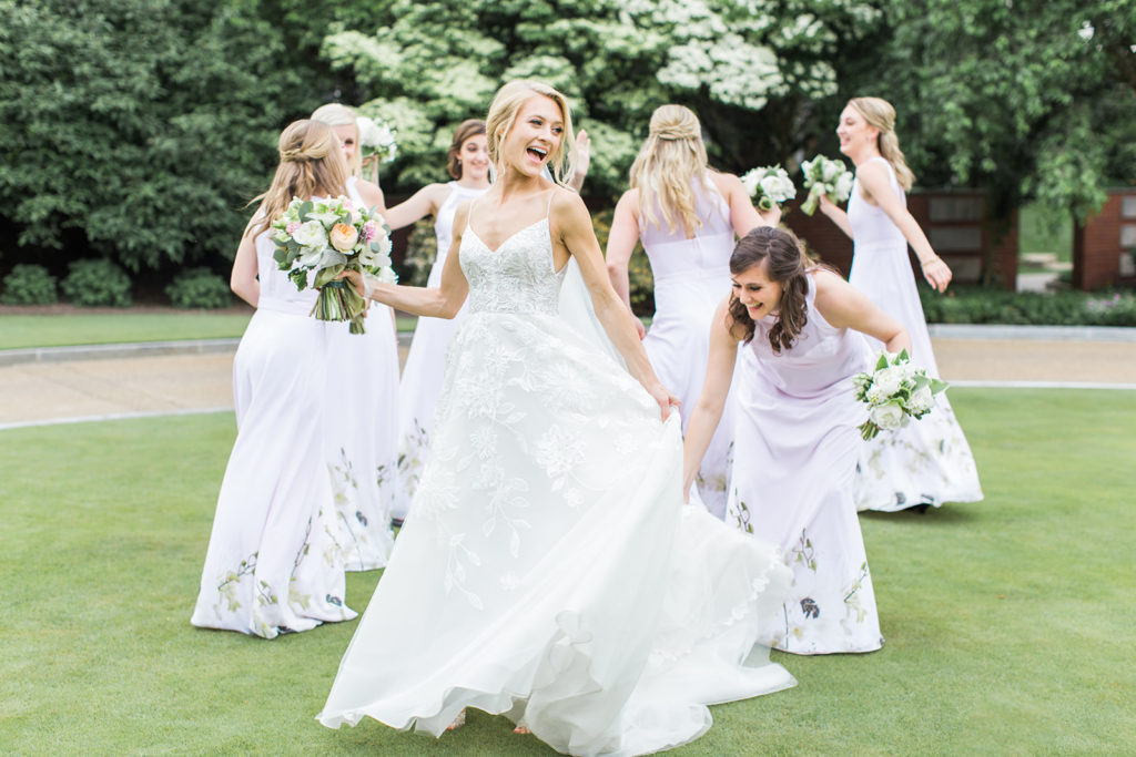 Candid bridal photo: Black Tie Fox Chapel Golf Club Wedding captured by Pittsburgh wedding photographer Lauren Renee