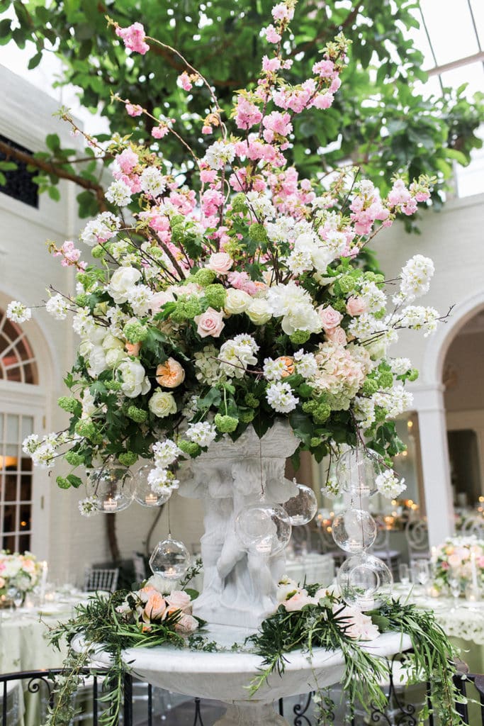 Tall wedding flower centerpieces: Black Tie Fox Chapel Golf Club Wedding captured by Pittsburgh wedding photographer Lauren Renee