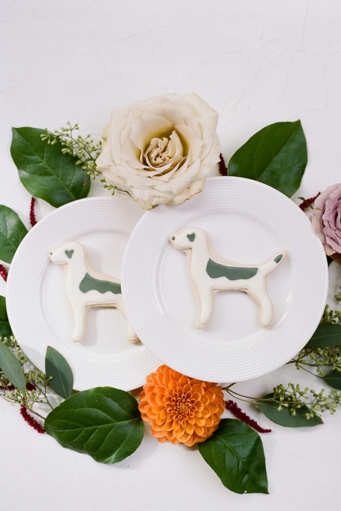 Homemade cookies in the shape of a sheep dog as party favors