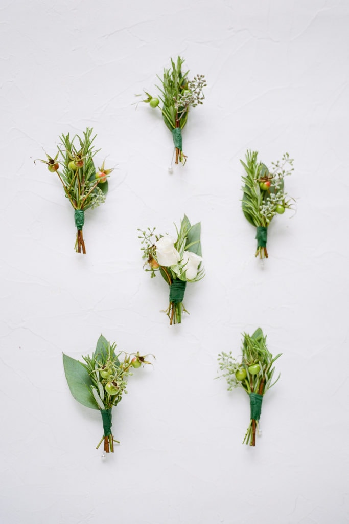 boutonnières for the groom and his groomsmen from the farmer's daughter flowers