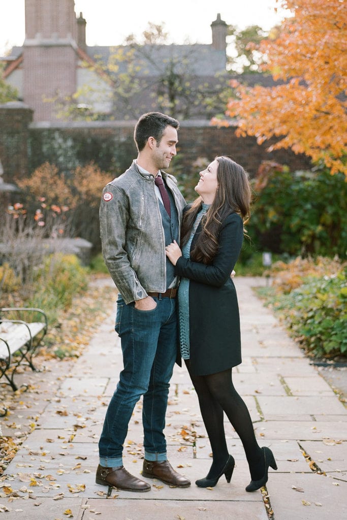 Couples posing during fall family photos at Mellon Park
