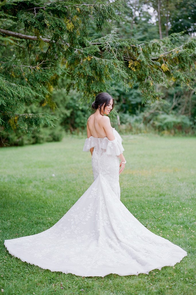 Bride in her Berta Bridal Gown outside