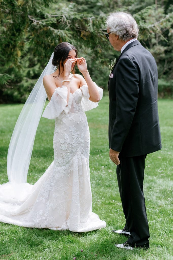 Bride seeing her dad during their first look