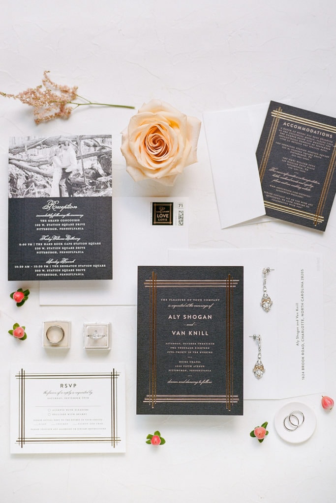 Black and gold art deco wedding stationery