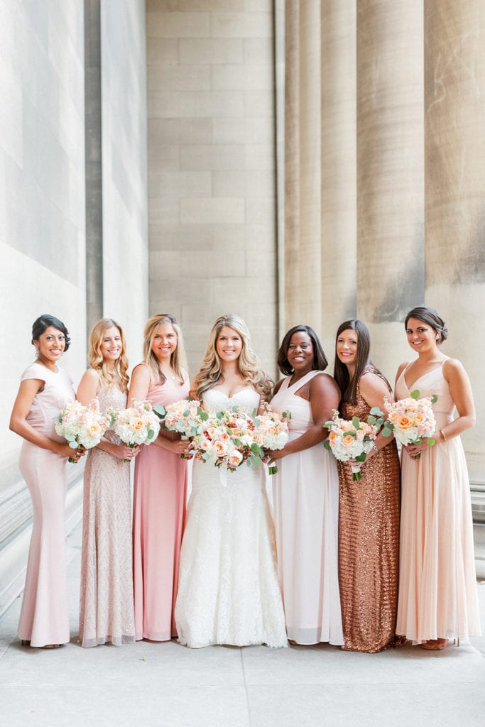 Mismatched blush and gold bridesmaids dresses