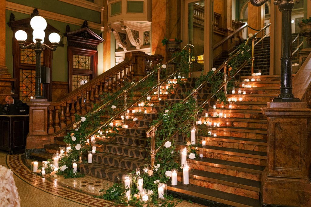 Grand Concourse stairs lined with candles and greenery for Pittsburgh Wedding