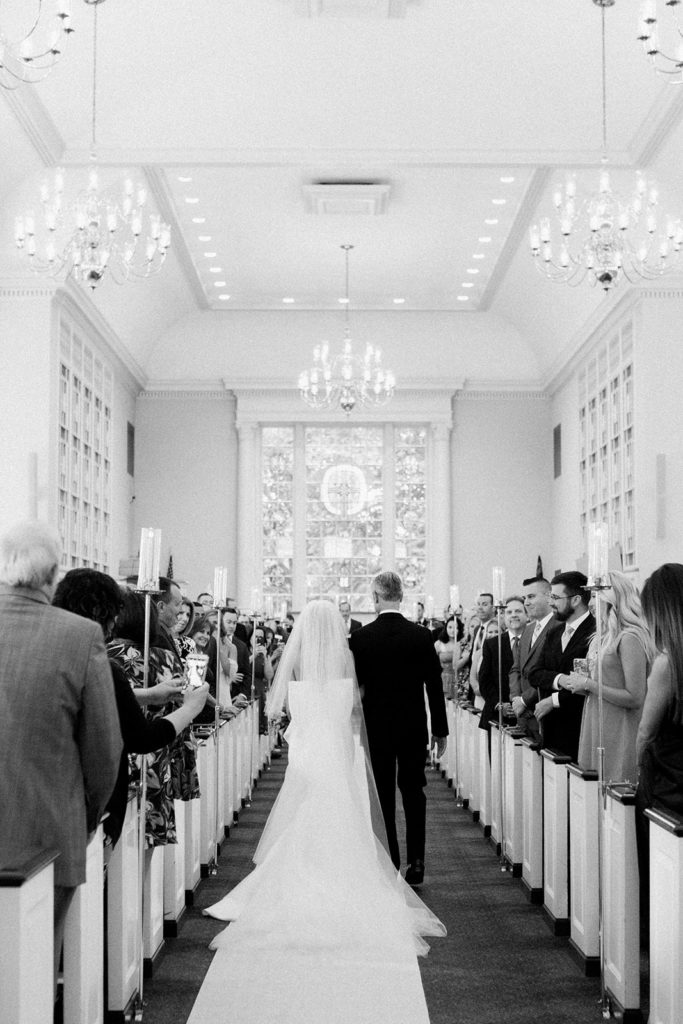 Father escorting bride down the aisle during Fox Chapel wedding