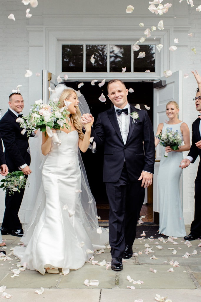 Bride and groom exit wedding ceremony