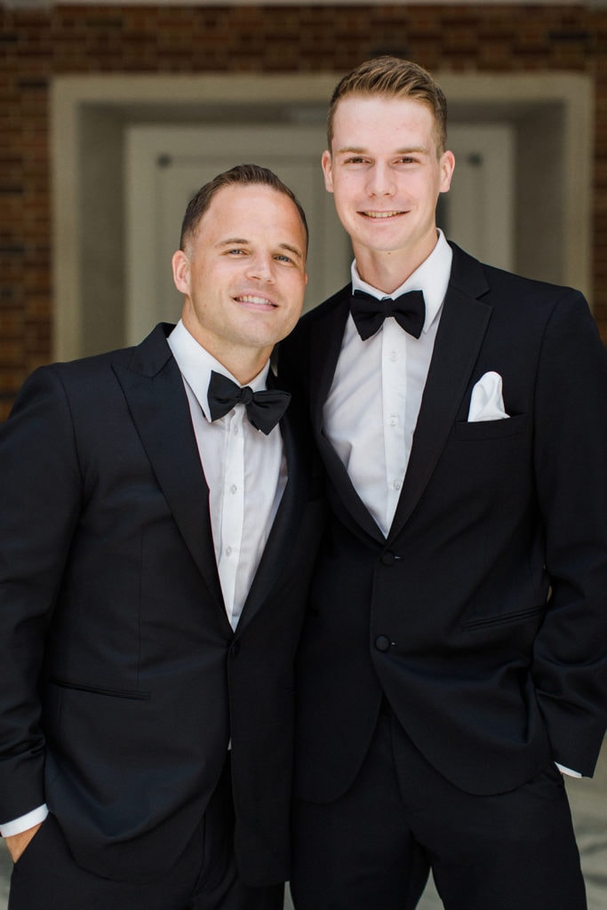 Groom posing with groomsmen