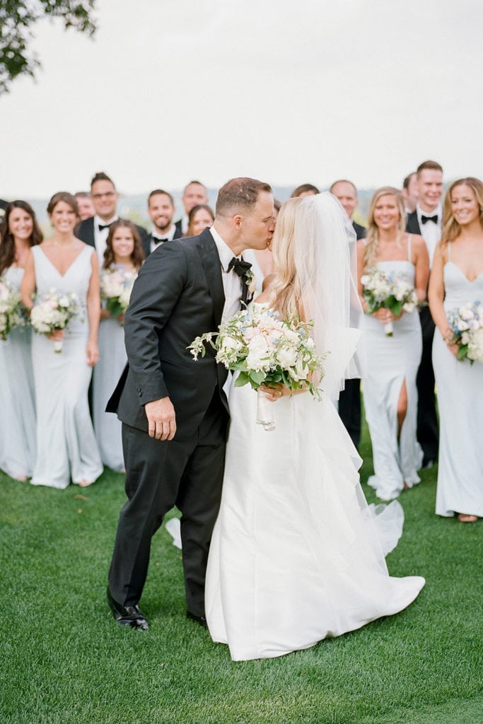 Bride and groom kissing