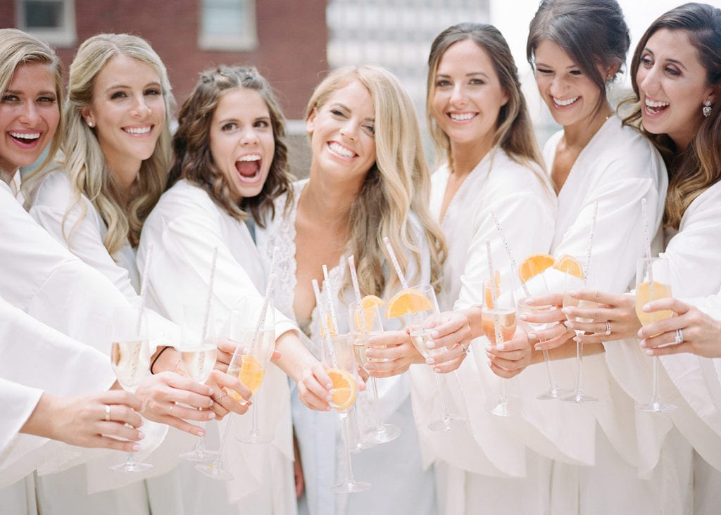 Bridal party toasting with champagne