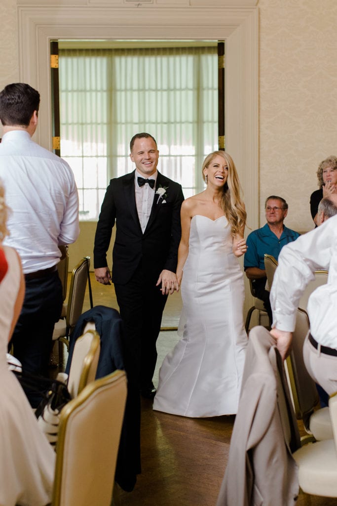 Bride and groom wedding reception entrance