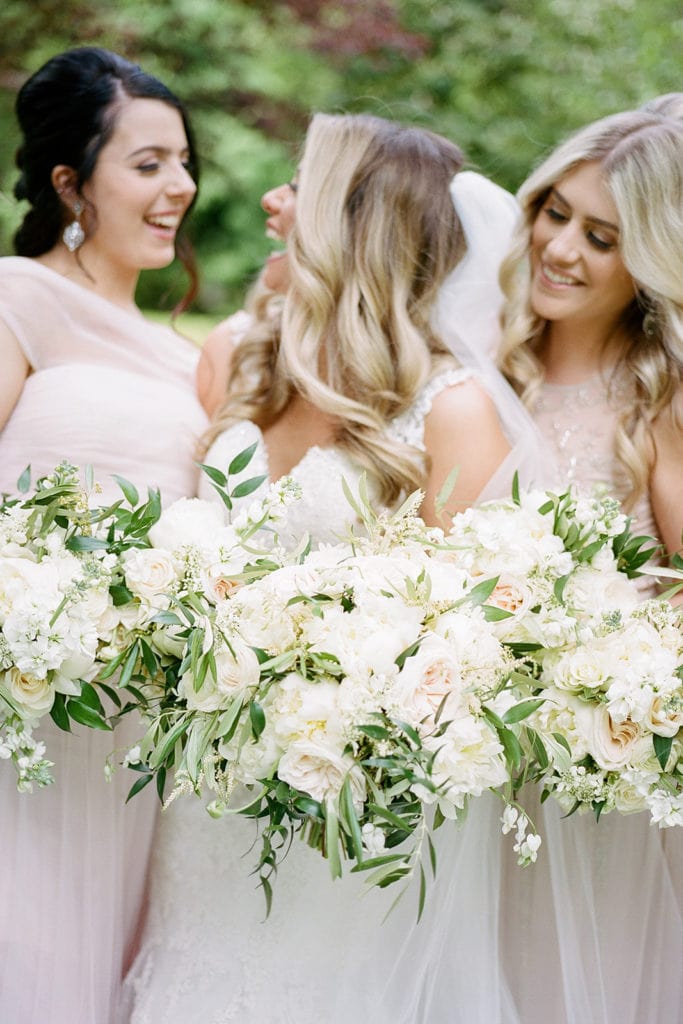 White wedding bouquets: Why You Should Hire a Hybrid Photographer by Lauren Renee