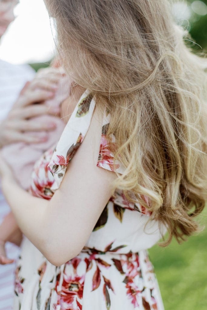 blonde hair blowing in the wind: outdoor newborn session