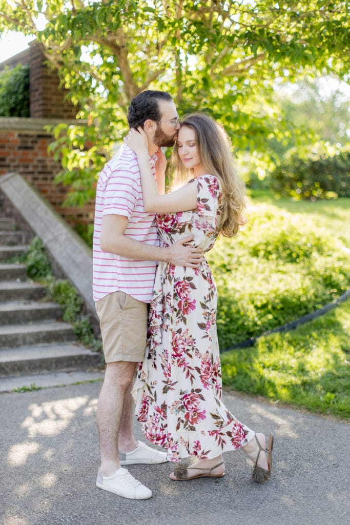 man and woman standing in an english garden