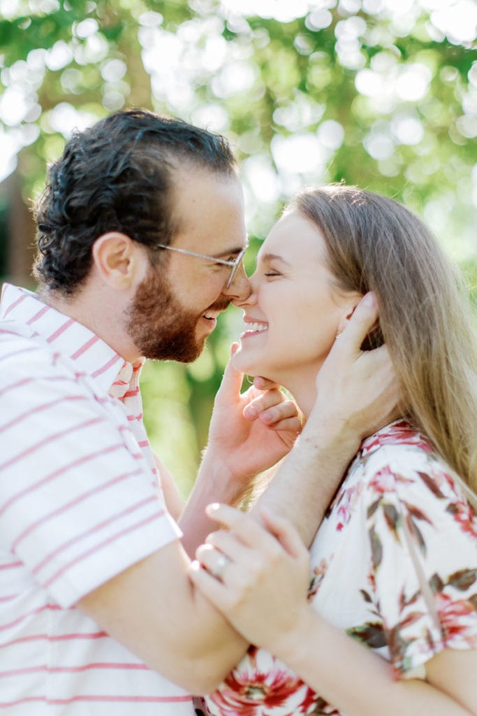 couple laughing and about to kiss