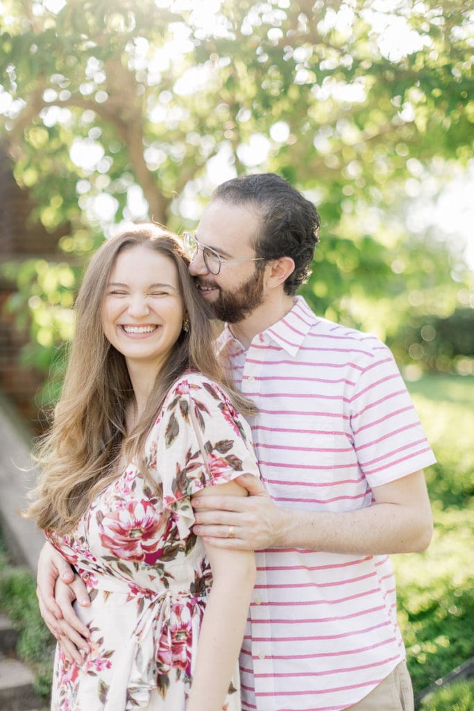 man and woman laughing together in mellon park