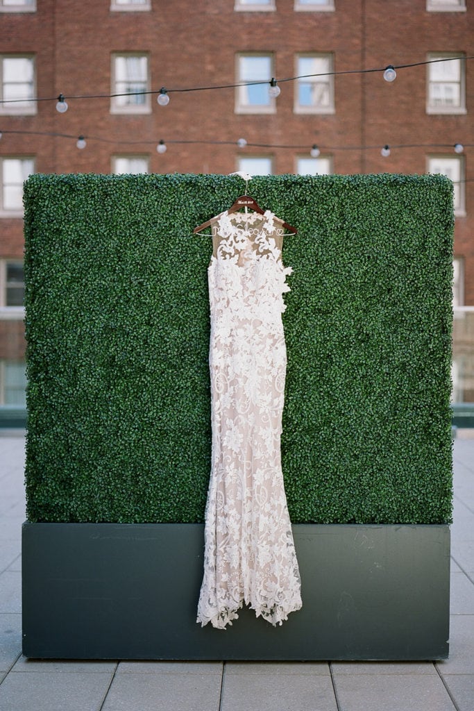 Hanging lace wedding dress