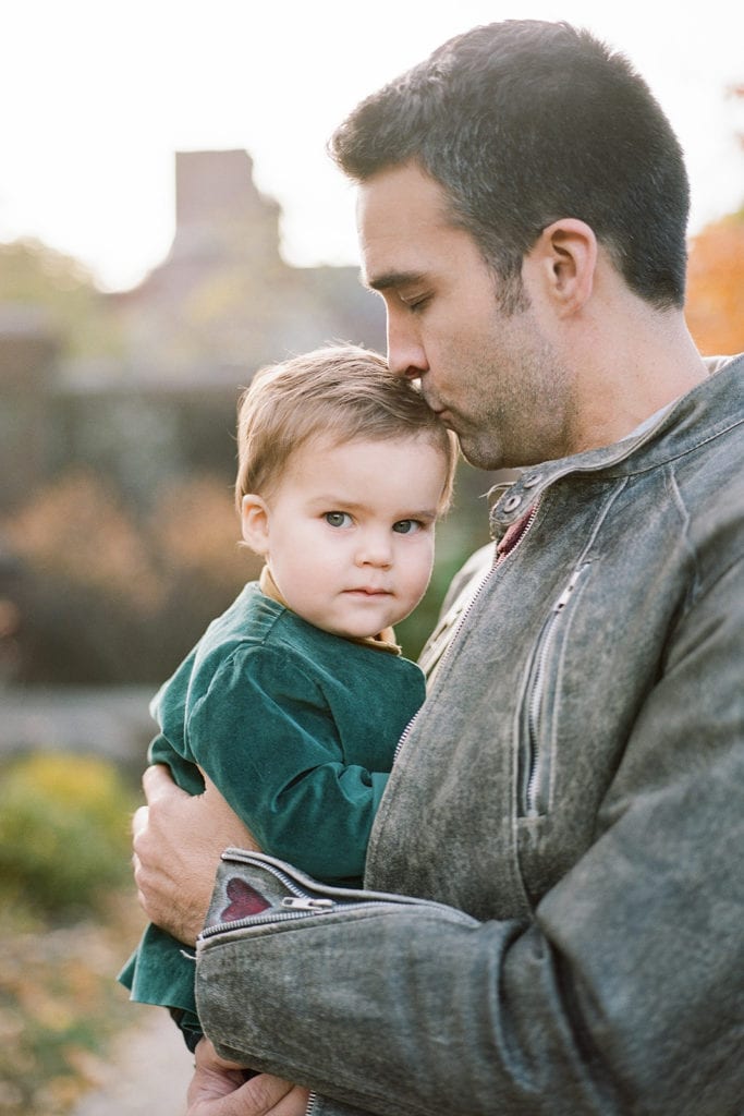 Toddler smiling during Pittsburgh family photos at Mellon Park