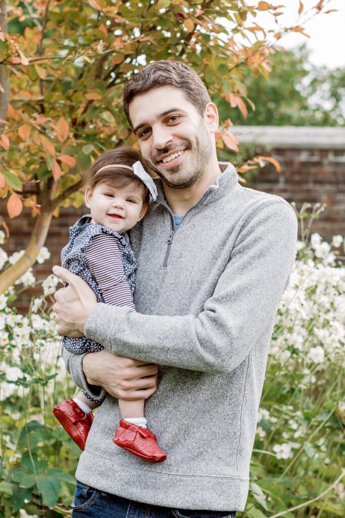 Dad holding baby girl