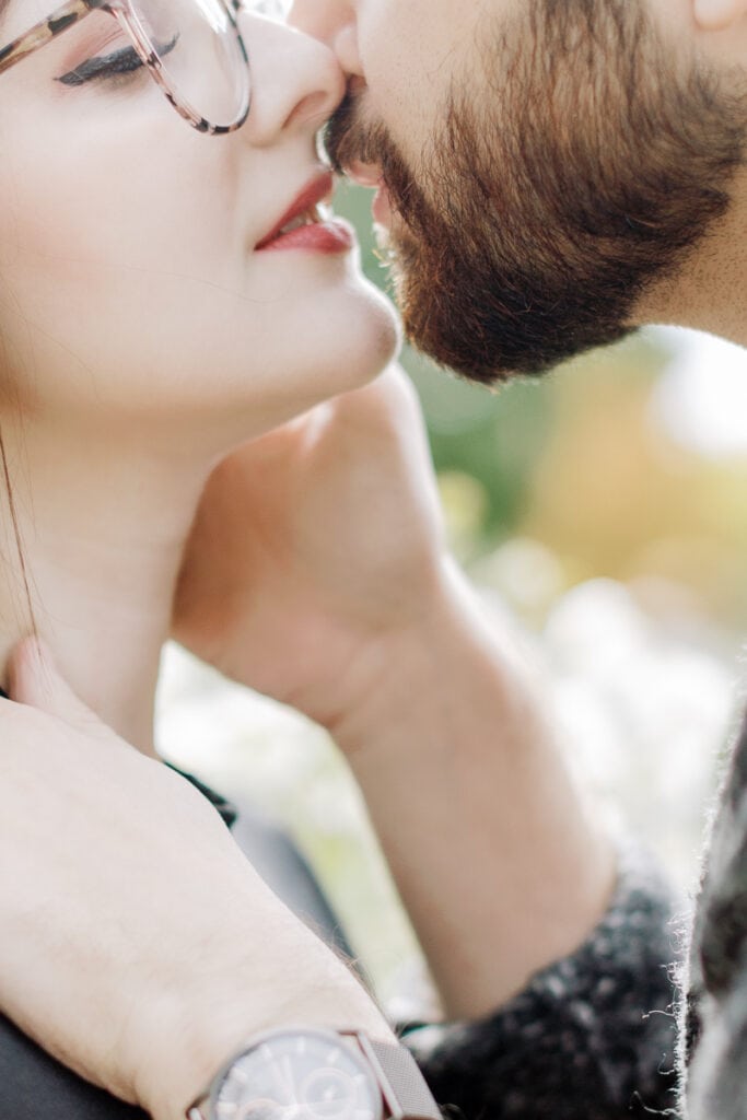 Husband and wife kissing