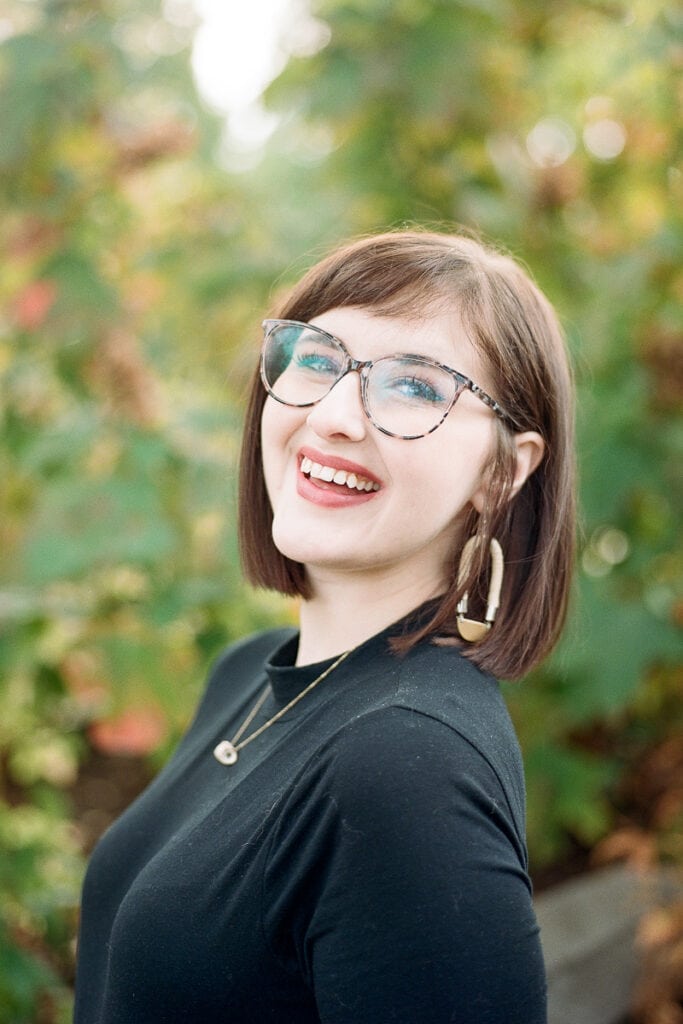 Woman in glasses smiling