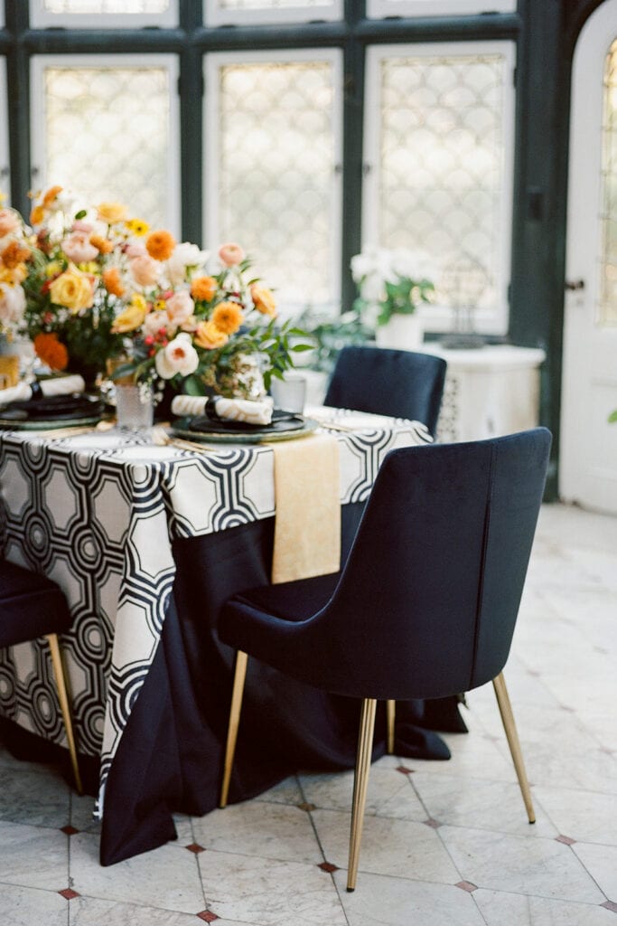 Velvet black and gold wedding table chairs