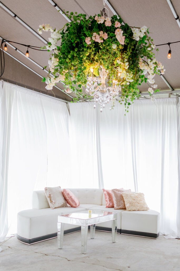 Pink and white wedding lounge area